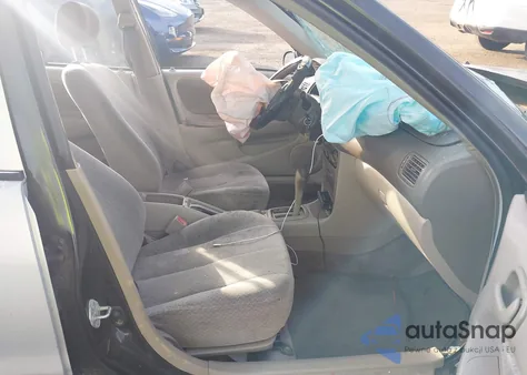 1999 Toyota Corolla Ce z USA, uszkodzony, nr VIN 2T1BR12E3XC206927